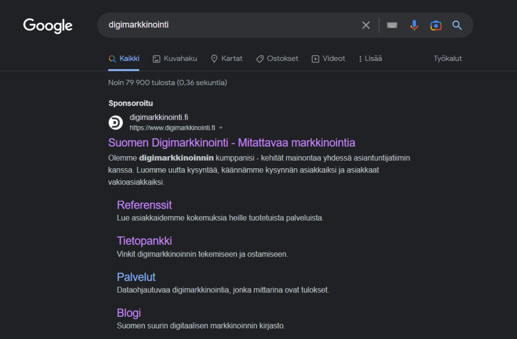 Google-mainonnan Sponsoroitu-ilmaisu maksullisen mainoksen yhteydessä.